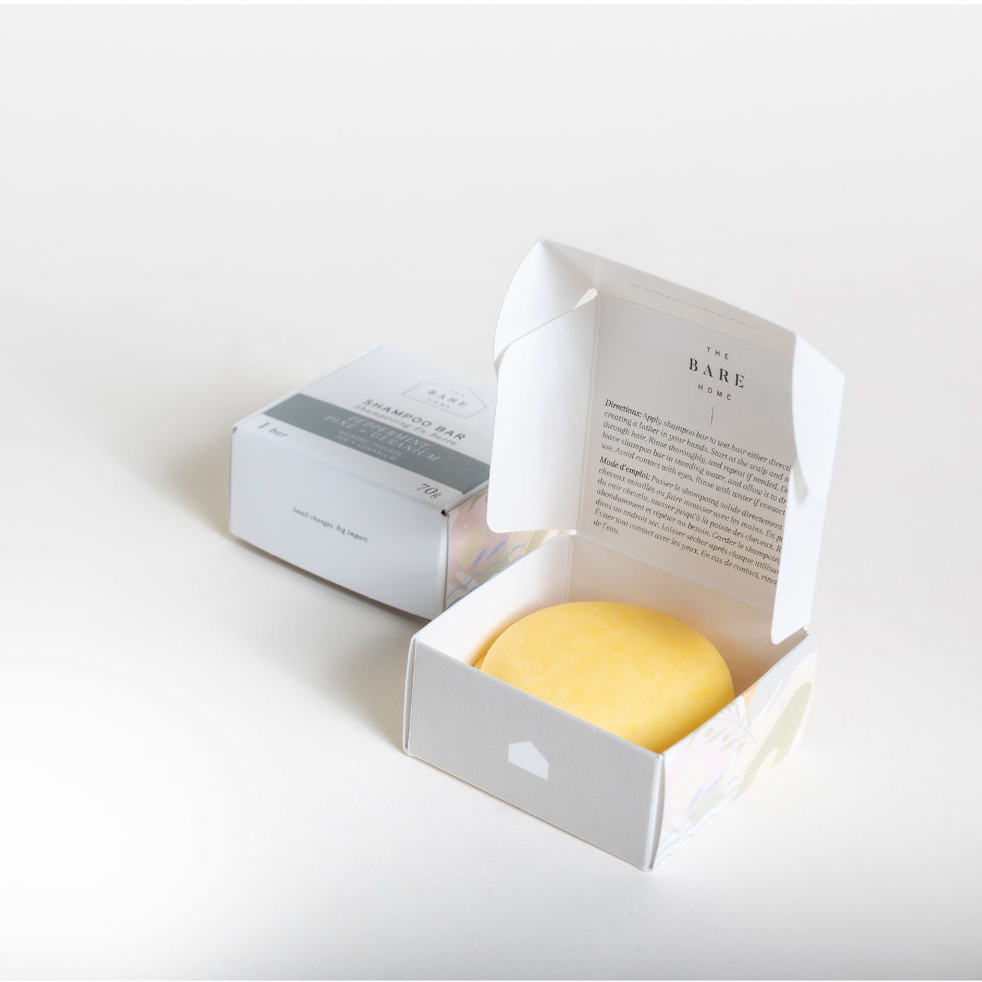 Open box containing Natural + Sustainable conditioner bar