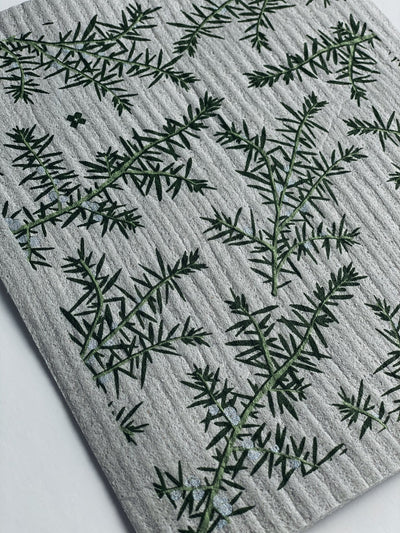 Juniper greens on grey sponge cloth
